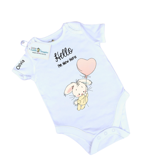 Baby white vest new baby with bunny with a balloon.